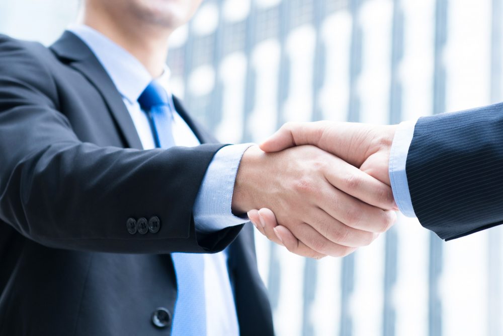 person shaking hands